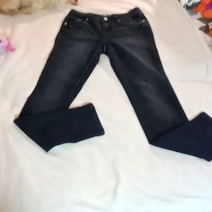 Earl Jeans Size 4 With Silver Trim around back pockets and the Front